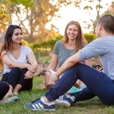 Students talking displaying positive traits of a teenage